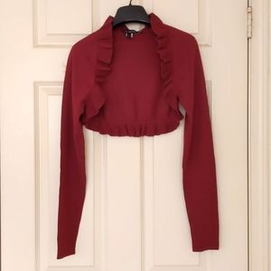 NWT. The Limited Woman's crop shrug with ruffle trim.